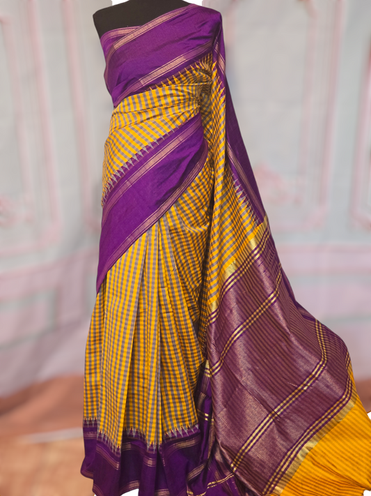 Yellow/purple check design raw silk saree with stitched blouse