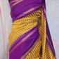 Yellow/purple check design raw silk saree with stitched blouse