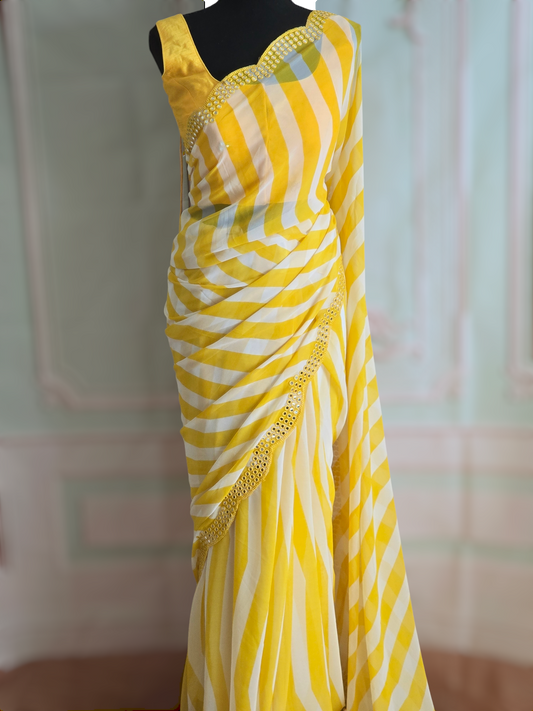 Yellow/white chiffon saree with border mirror work- stitched sleeveless blouse