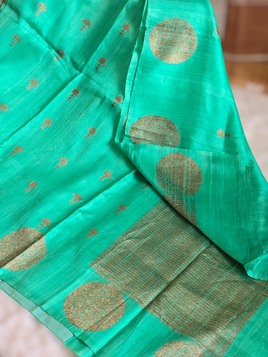 Pure raw silk saree(sea green/blue) with antique gold design- stitched blouse