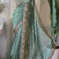 Sage green designer crushed tissue saree with heavy work- stitched designer sleevless blouse