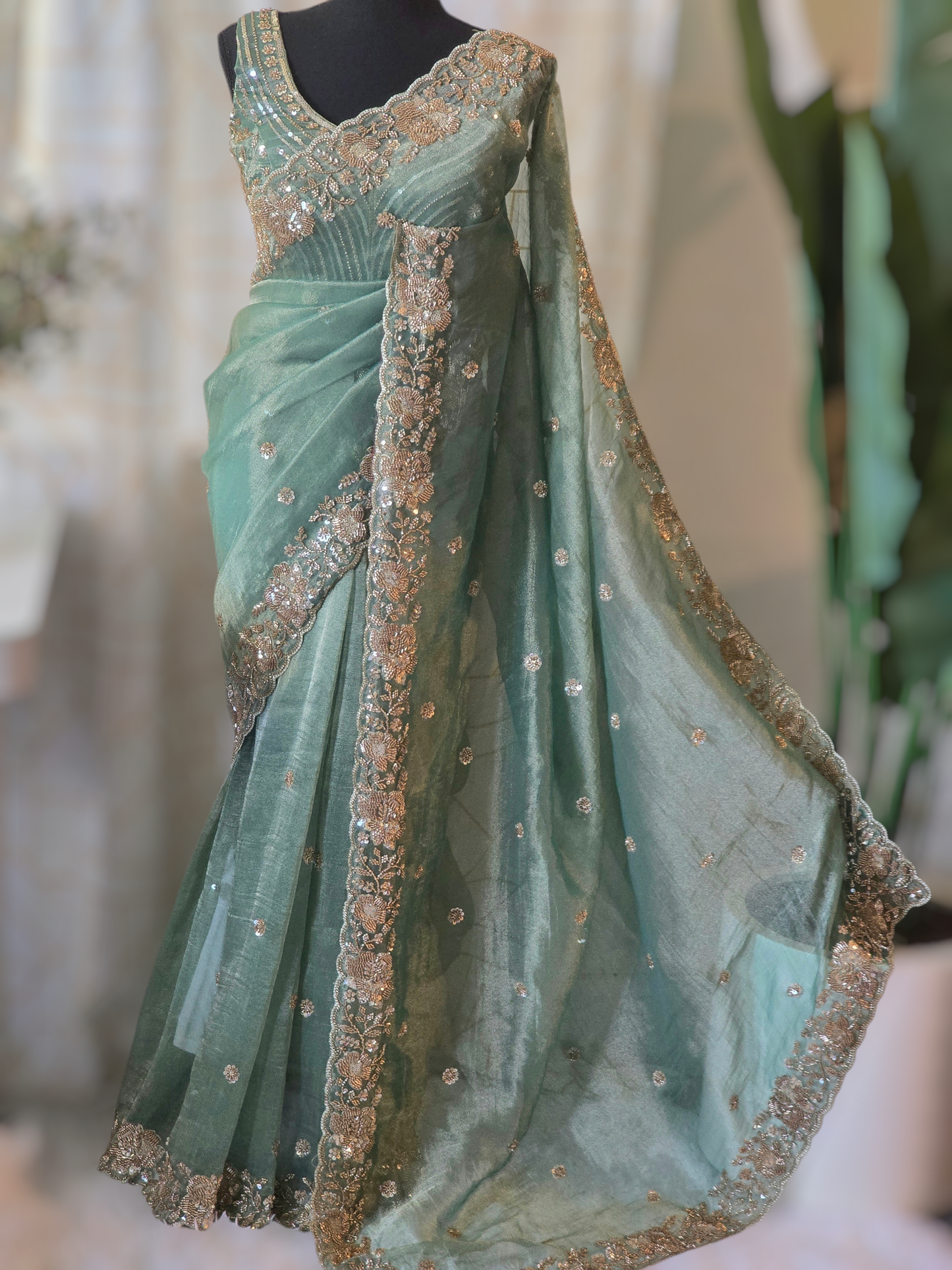 Sage green designer crushed tissue saree with heavy work- stitched designer sleevless blouse