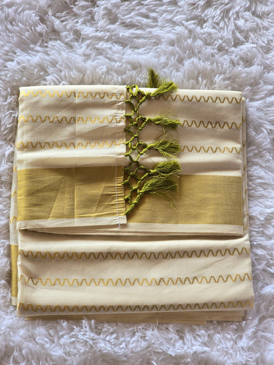 Set saree qith golden design all over body- green tassles