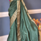 Crape silk saree with check design body= stitched contrast blouse