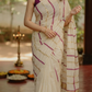 Soft cotton onam saree with purple/ gold stripes