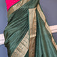 Crape silk saree with check design body= stitched contrast blouse