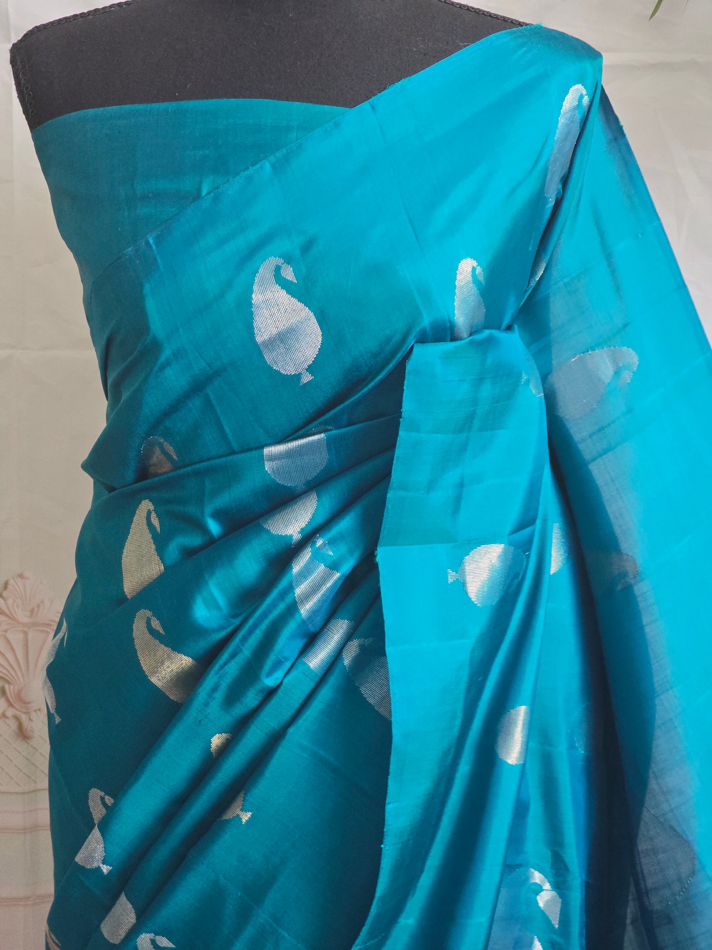 Soft silk kancheepuram with silver design- stitched sleevless blouse