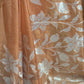 Turquish organza saree ( burnt orange) with applique work- stitched blouse