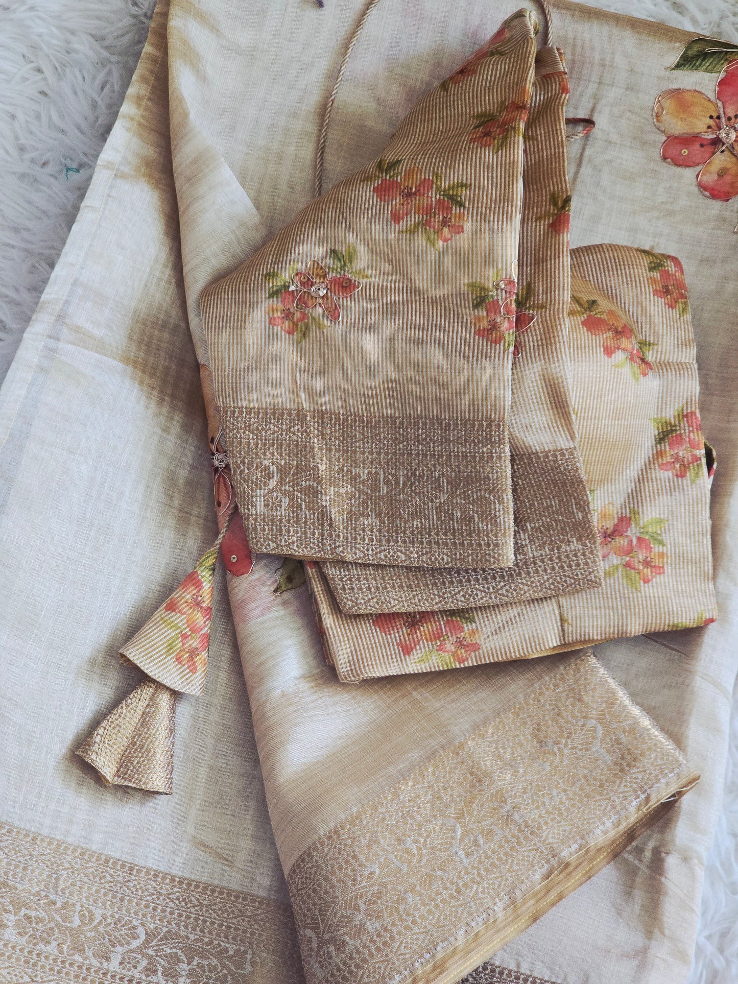 Semi tissue silk saree qith floral design- stitched blouse size 32-38