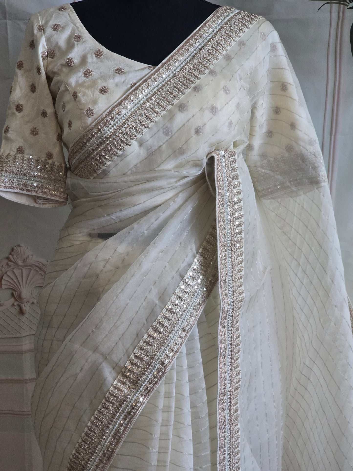 Off white organza saree with sabyasachi border- stitched blouse