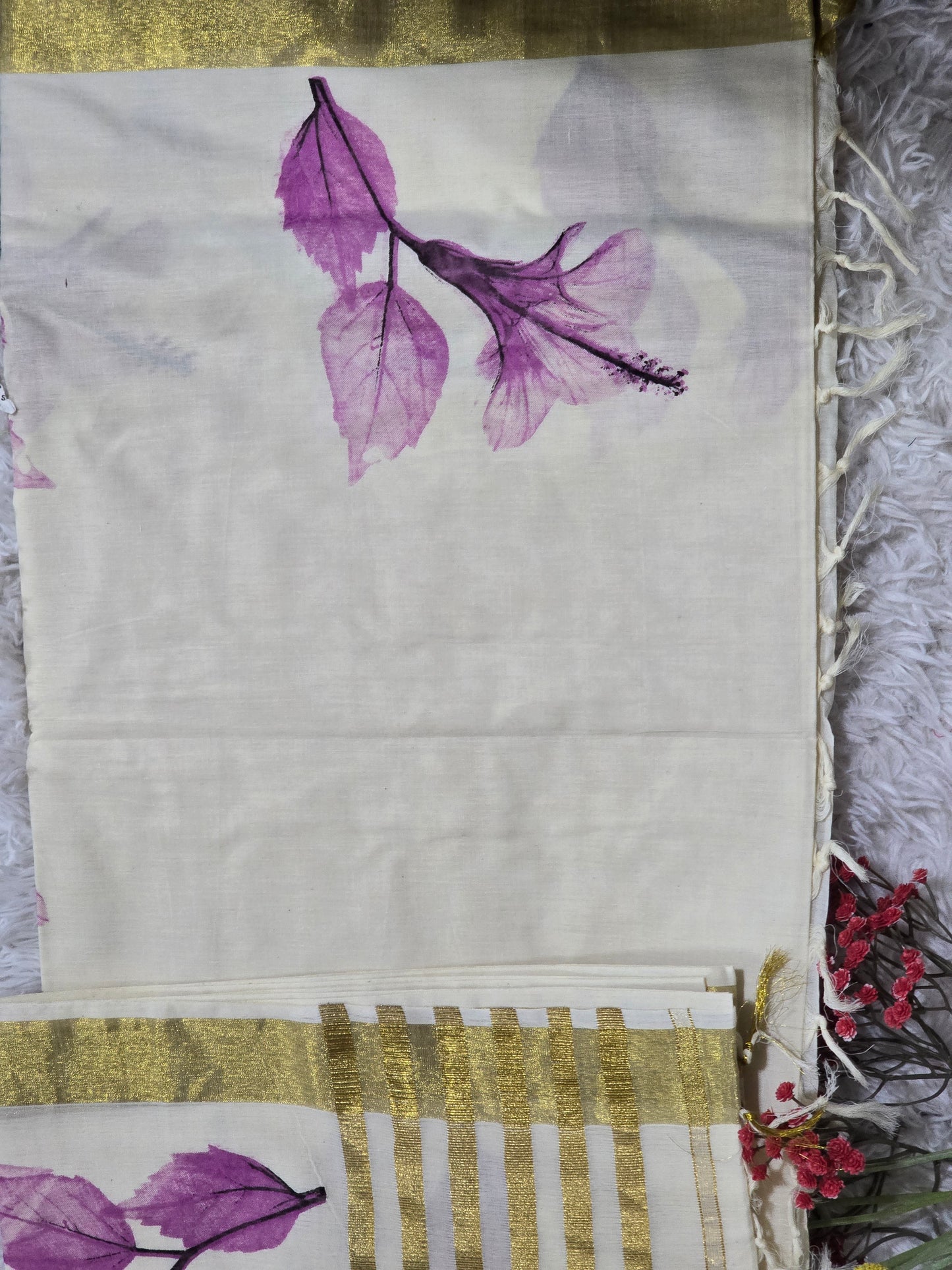 Cotton onam saree with purple printed design