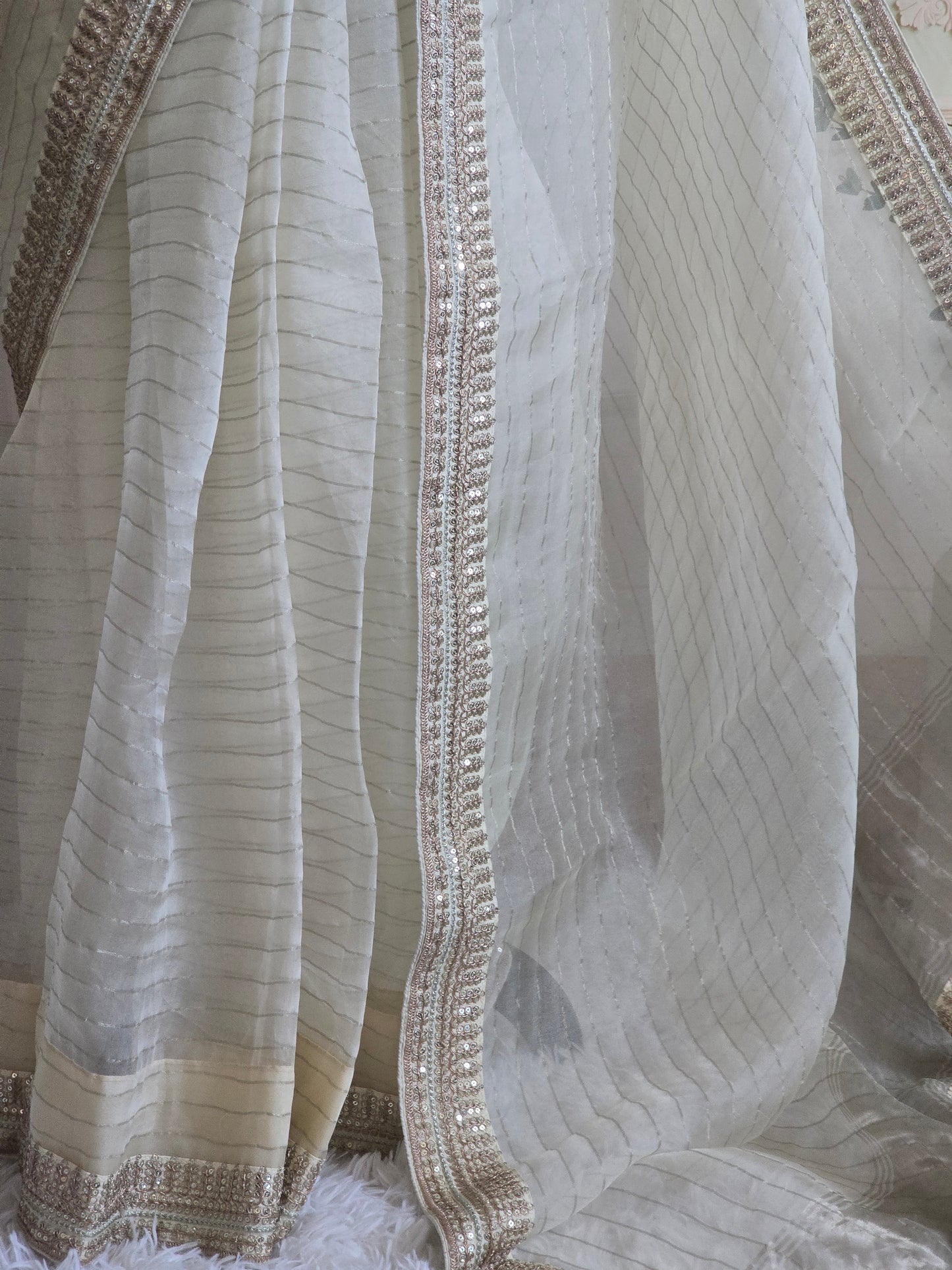 Off white organza saree with sabyasachi border- stitched blouse