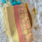 Tissue silk saree with beautiful design border