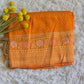 Semi munga (orange) silk saree with stitched blouse