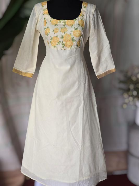 A line onam kurti with yoke print