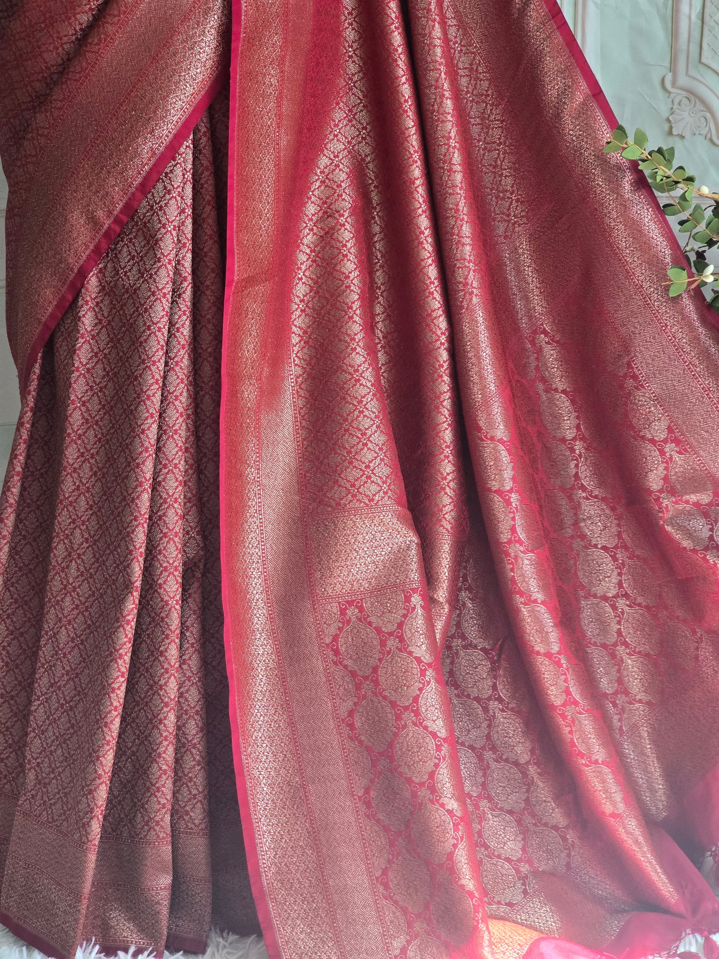 Reddish maroon semi katan brocade saree with stitched blouse