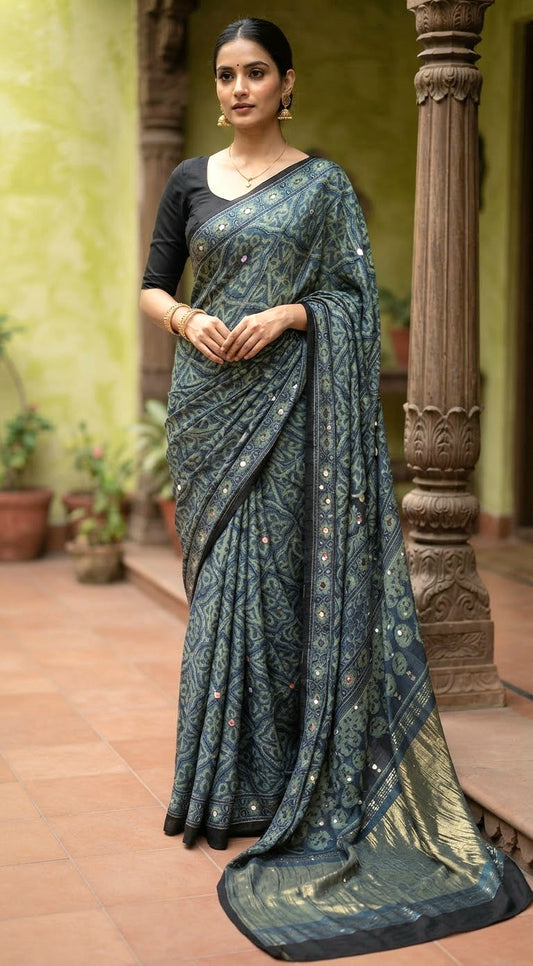 Modal silk with ajrakh print mirror  work saree with stitched blouse ( black)