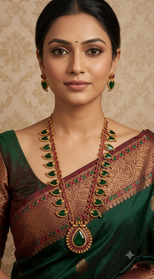 Long mango design green haaram set with earrings