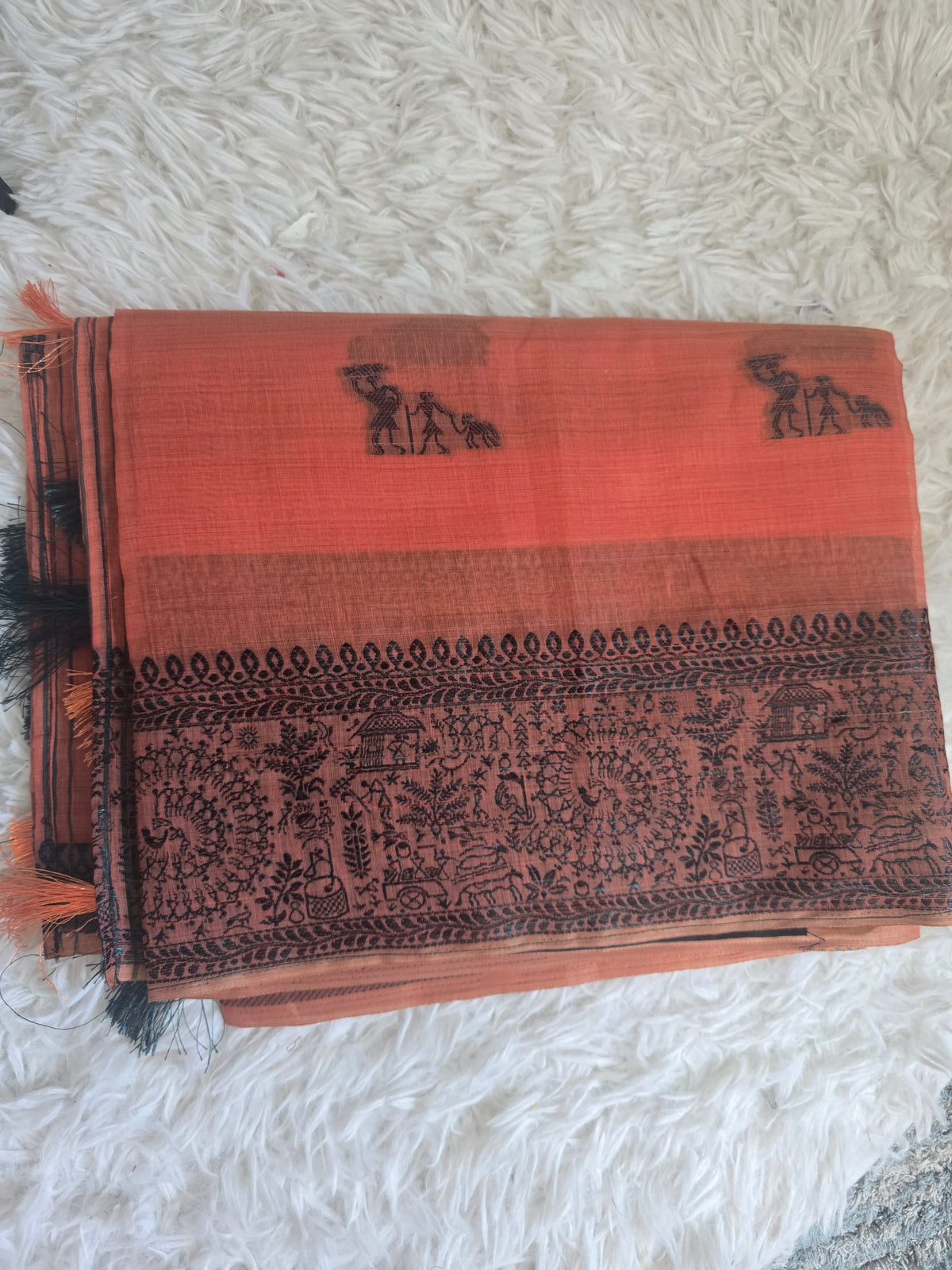 Chanderi cotton saree with warli motifs paired with stitched blouse