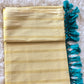 Tissue set saree with gold stripes- blue tassles