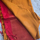 Mustard yellow and red semi soft silk saree with Bp