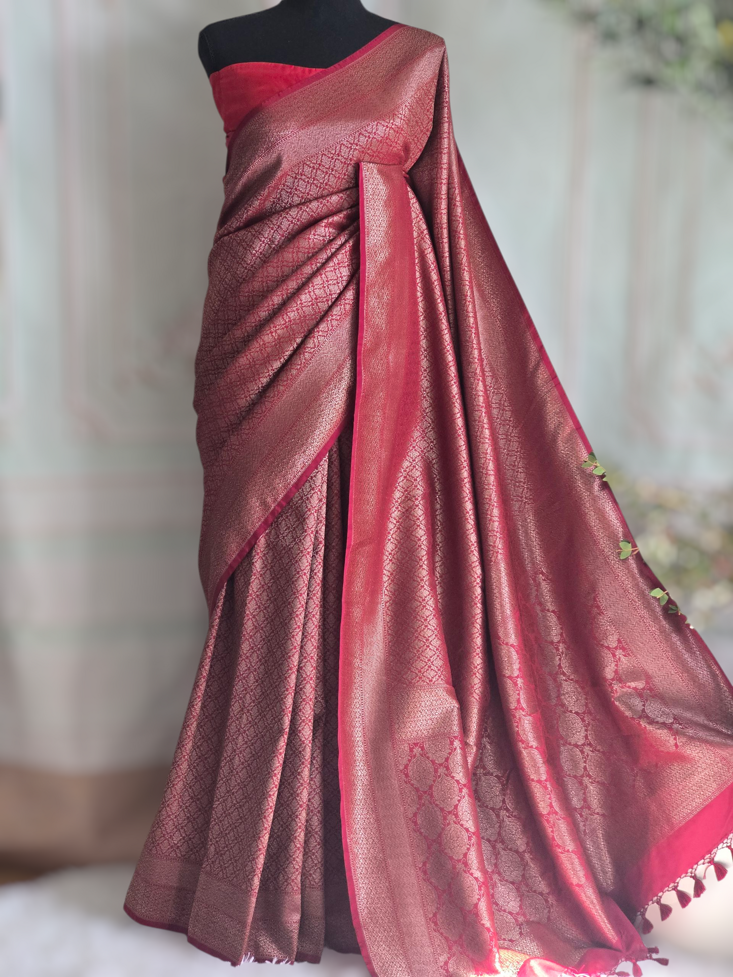 Reddish maroon semi katan brocade saree with stitched blouse