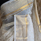 Mul cotton saree with small gold buttas and border (fall and pico done)NO Blouse piece