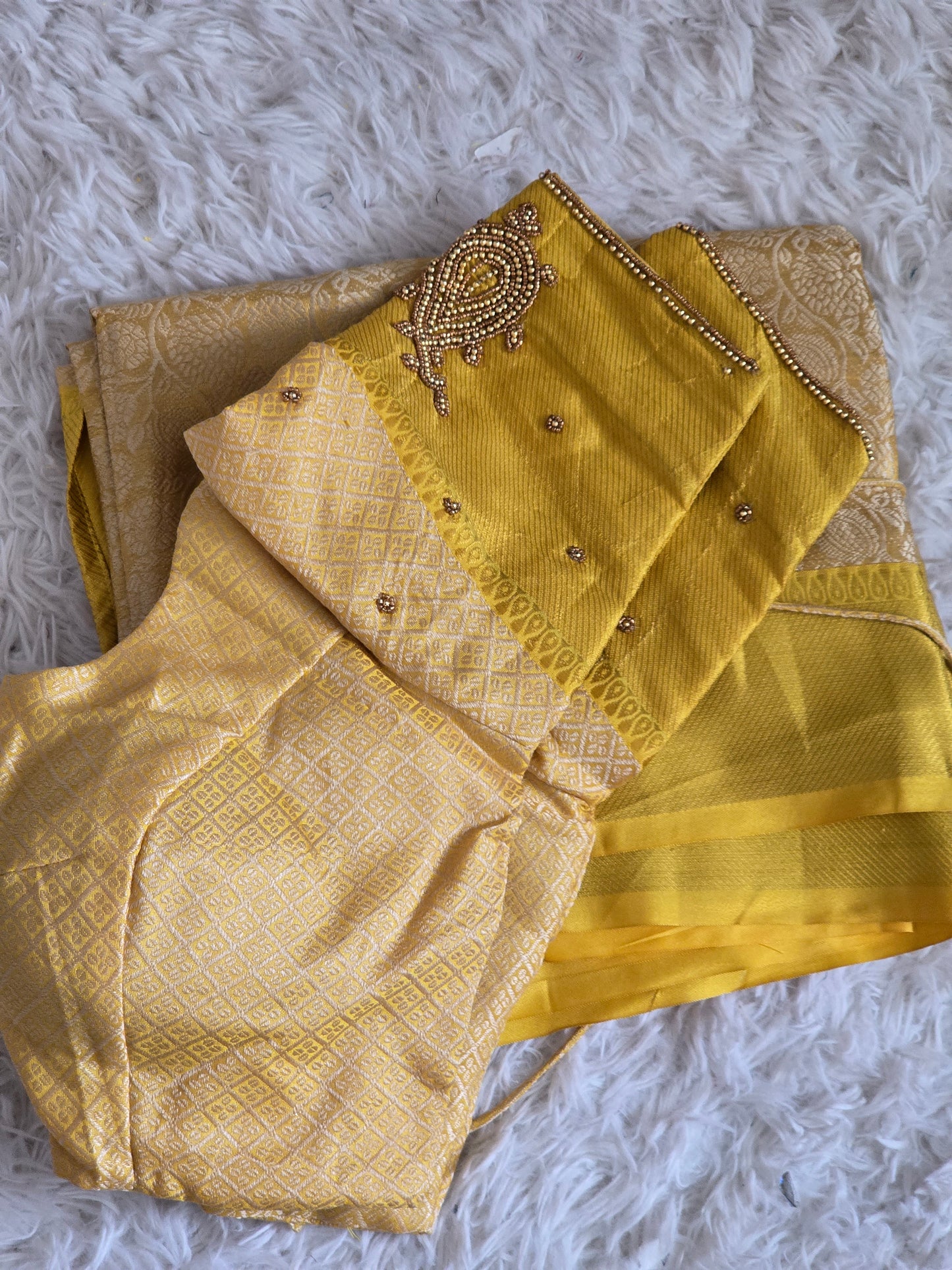 Semi tissue saree with stitched blouse
