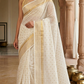 Mul cotton saree with small gold buttas and border (fall and pico done)NO Blouse piece