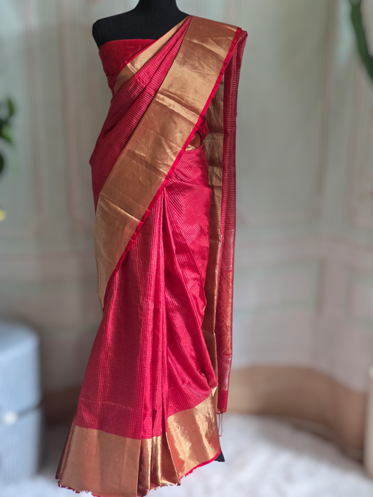 Kancheepuram soft silk check design saree with copper zari-stitched blouse