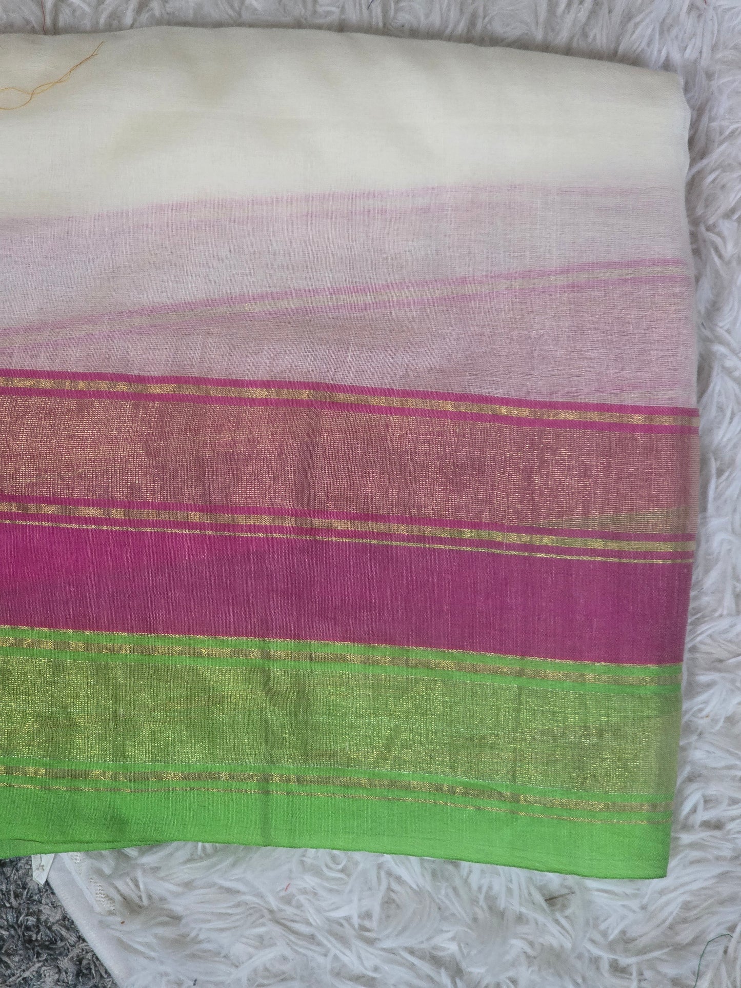 Mul cotton saree with light green pink zari border