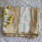 Semi silk gold creme saree with stitched blouse