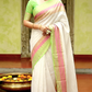 Mul cotton saree with light green pink zari border