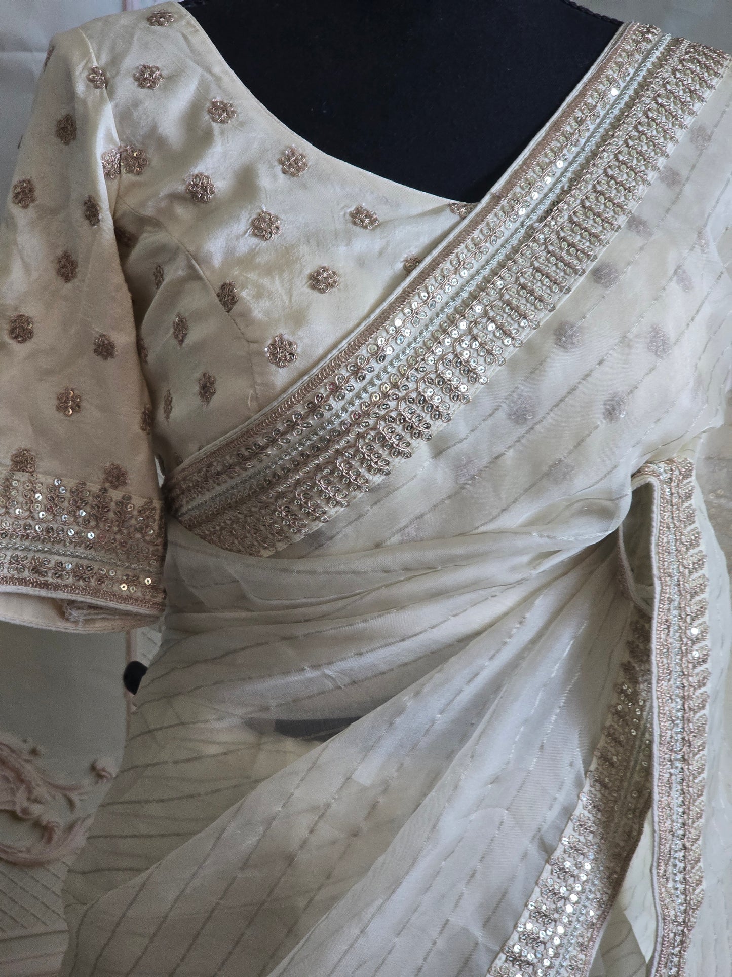 Off white organza saree with sabyasachi border- stitched blouse
