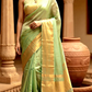 Semi tissue( pastel green)saree with stitched blouse ( elbow sleeve)