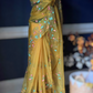Mustard yellow organza saree with threadwork