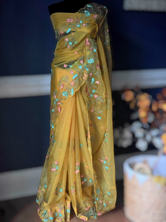 Mustard yellow organza saree with threadwork