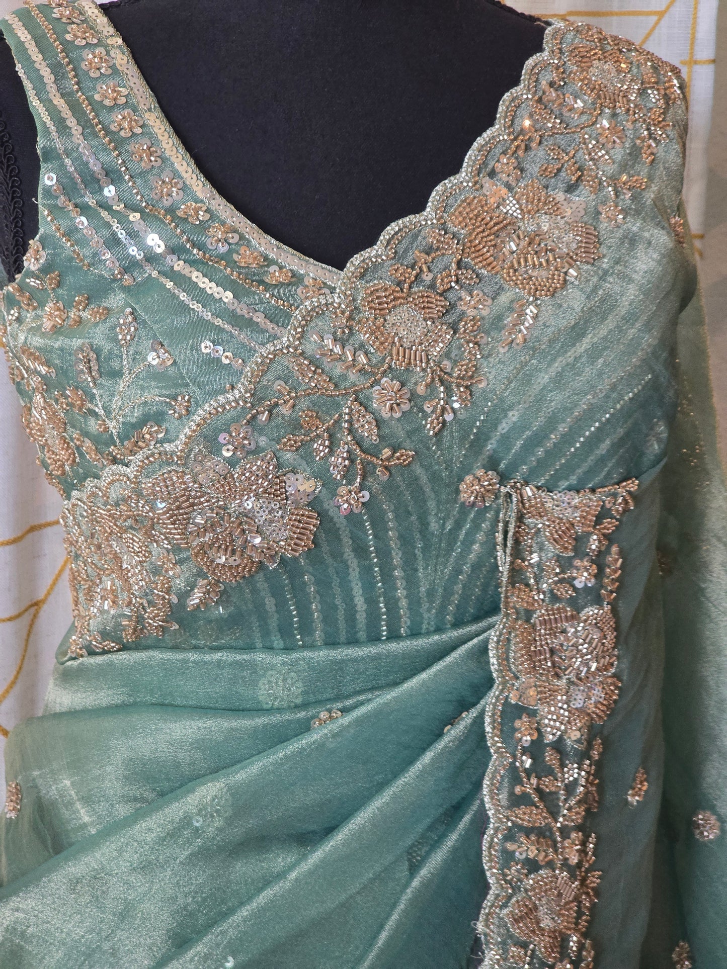 Sage green designer crushed tissue saree with heavy work- stitched designer sleevless blouse