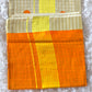 Tissue set saree check design- duel tone with orange polka dots