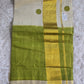 Tissue set saree with green polka dots(duel shade)