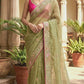 Semi organza saree with beads work- stitched sleevless blouse