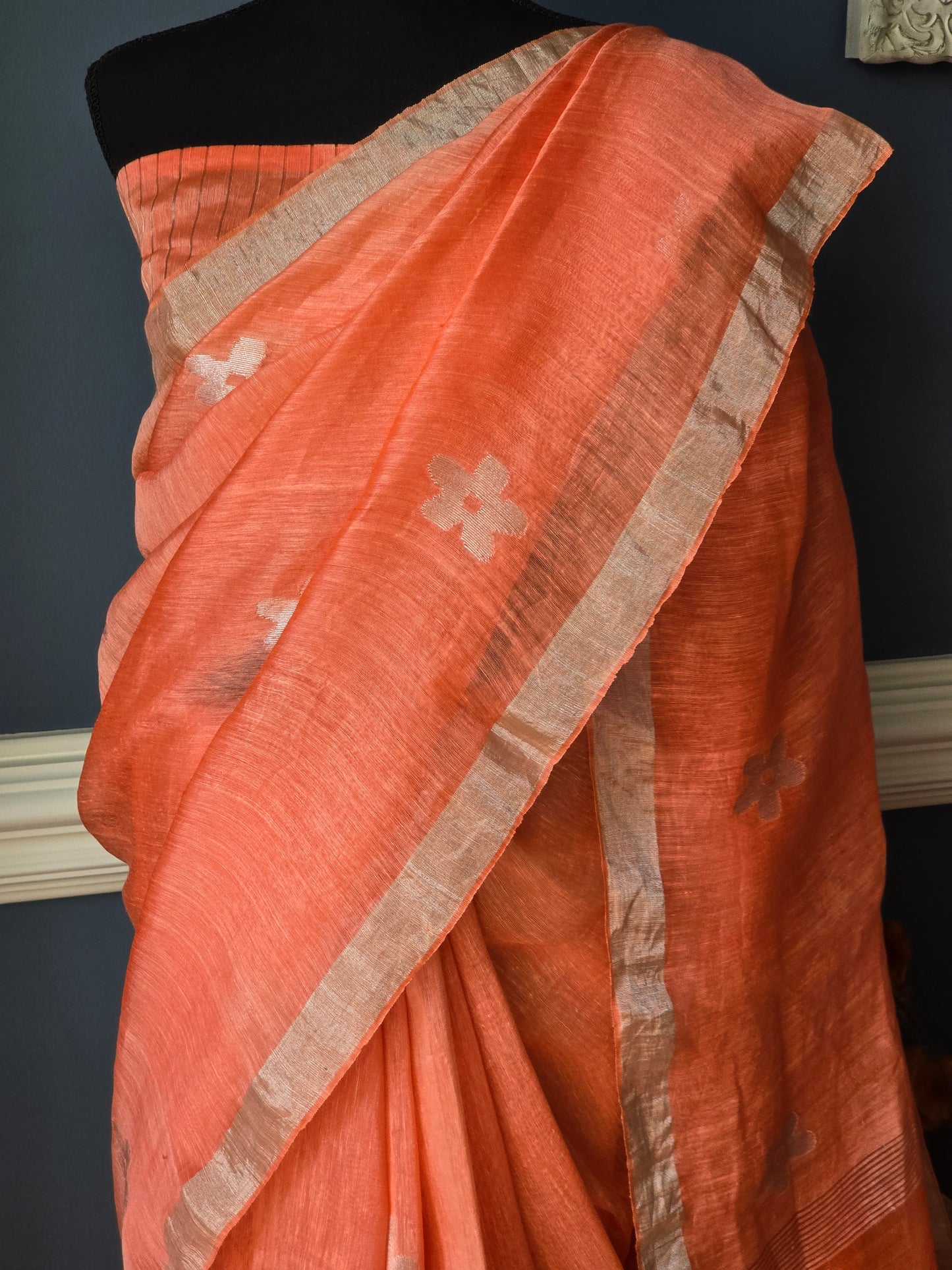 Matka linen saree with silver zari- stitched blouse